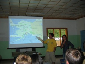 John Pile Jr presents to a group of Siberian Rotaractors about the organization in Alaska.